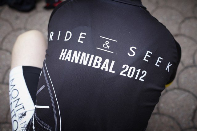 The back of a person wearing a Ride and Seek Hannibal 2012 jersey.