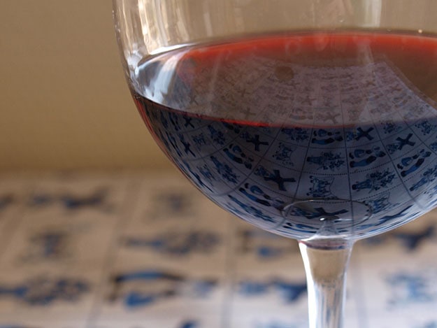 A close up of a glass of  red wine.