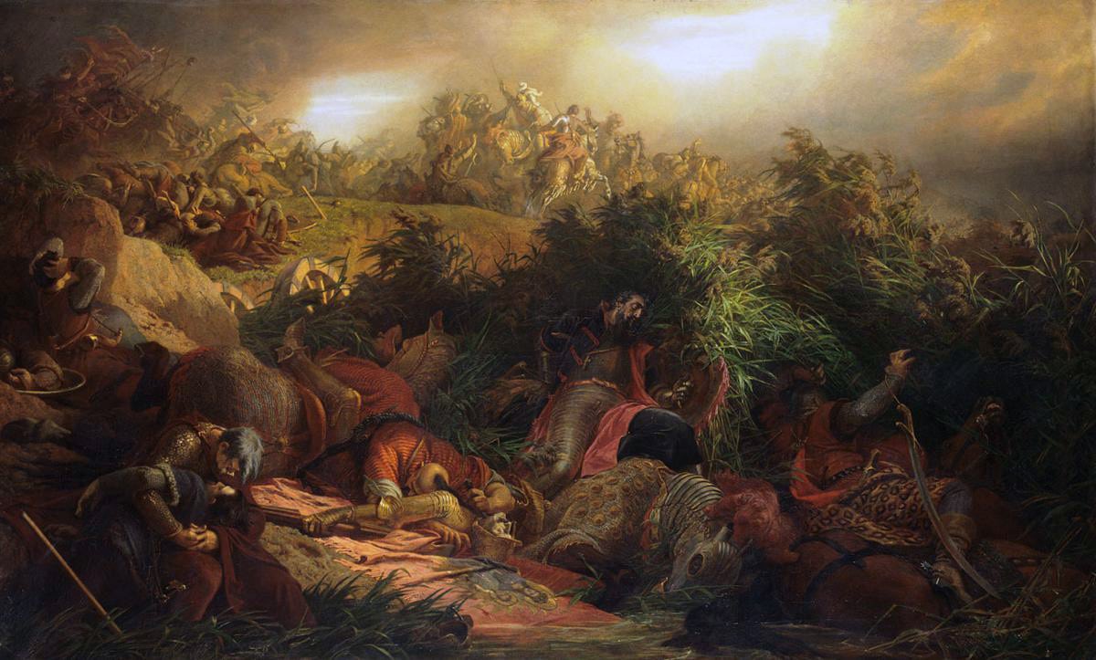 A painting of a battle scene. Soldiers on horses battle foot soldiers in the background. More soldiers lie wounded in the foreground.
