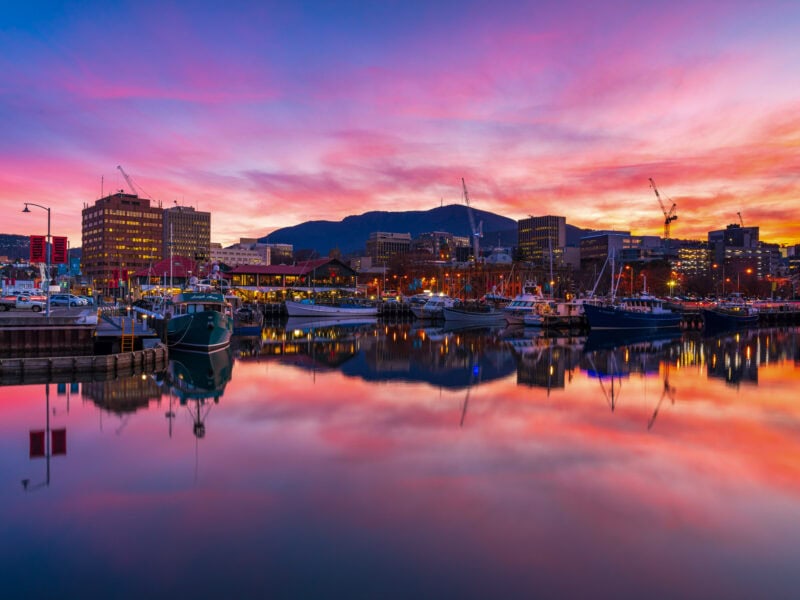Sunset over the Port of Hobart Harbour, view of Mount Wellington (kunanyi) in the background