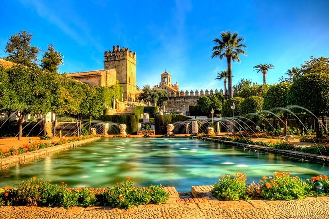 A photo of the Alcazar from the pool in the garden.