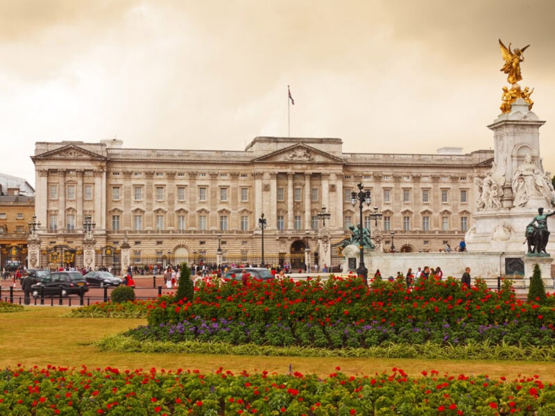 Buckingham Palace taken from the front of the Queen Victoria memorial. The gardens are in flower.