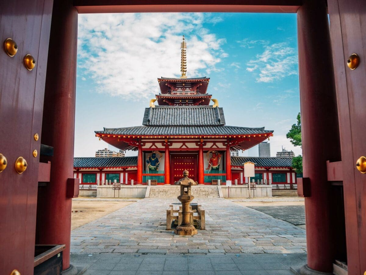 Samurai Shitenno ji Temple in Osaka seen through a traditional doorway.