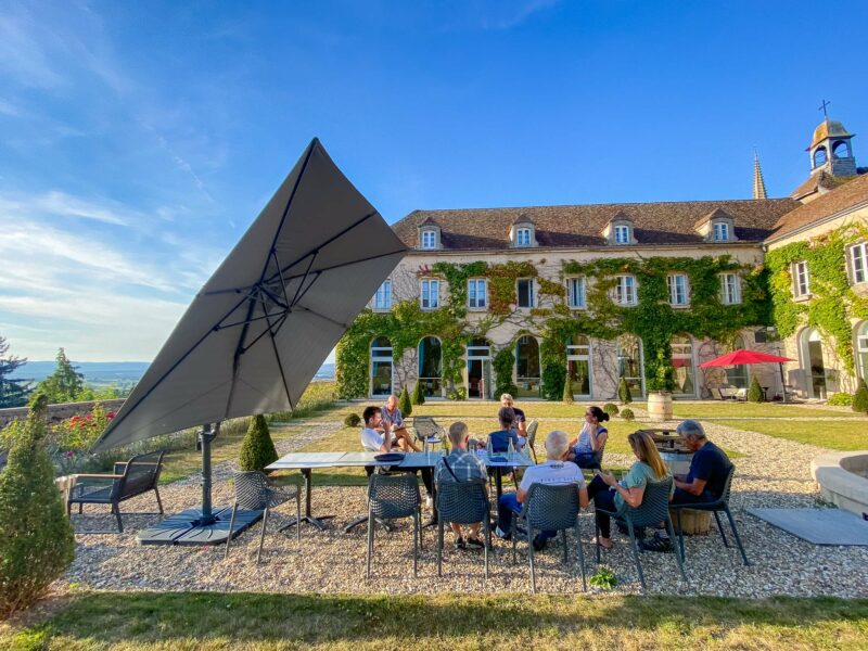 Group dining outdoors at hotel