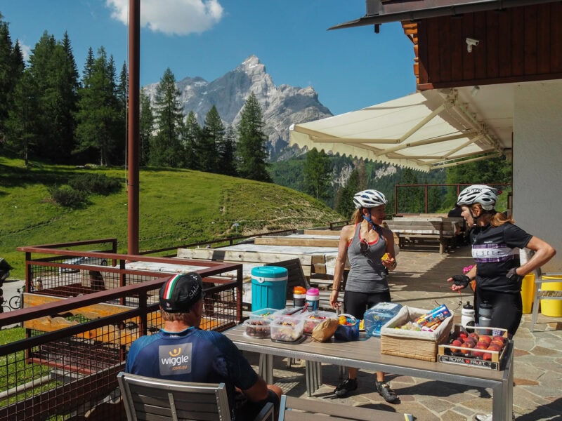 Cyclists resting at mountain cafe
