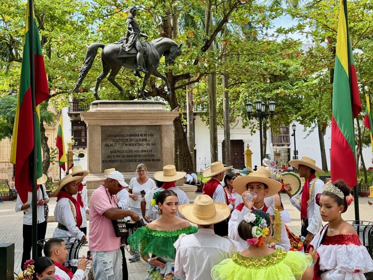 Traditional street party by the Simón Bolívar statue in Cartagena, Colombia, on the Bolivar cycling tour