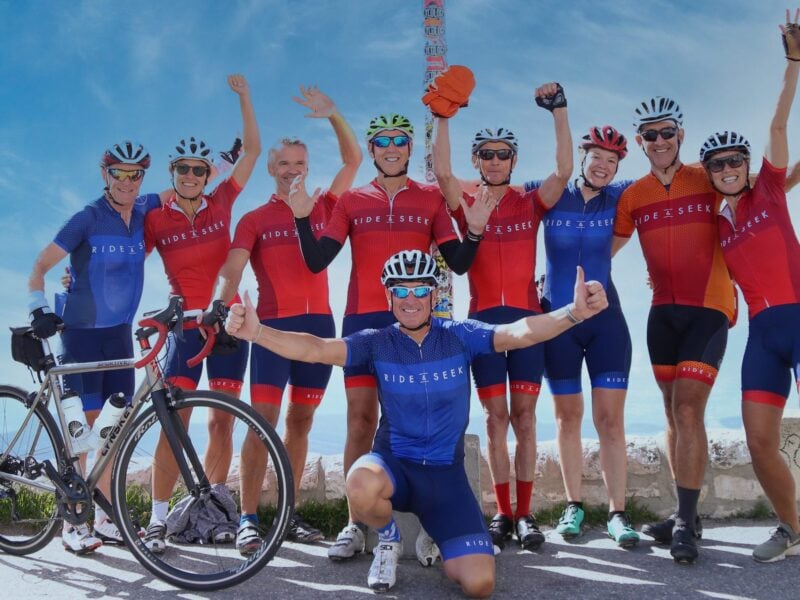 Ride & Seek cycling tours group celebrating at Mont Ventoux summit