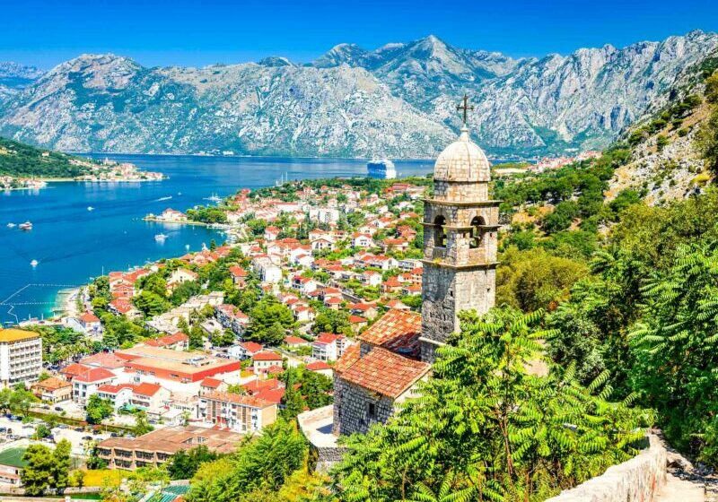 Marco Polo Kotor, Montenegro View from the top of the hill overlooking the seaside town of Kotor and the Adriatic Sea in the background