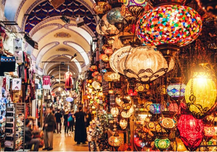 Sultans_trail A colourful alley in a bustling Moroccan city madina.
