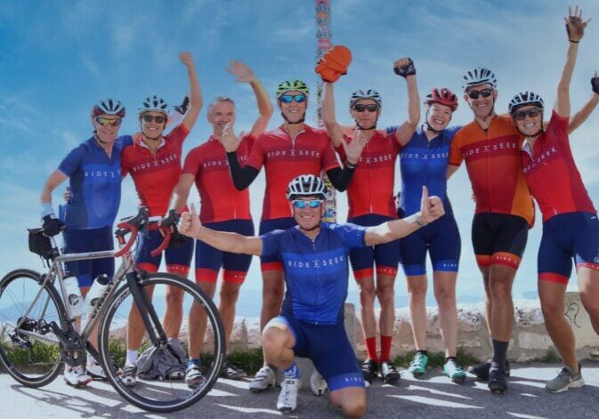 Ride & Seek cycling tours group celebrating at Mont Ventoux summit